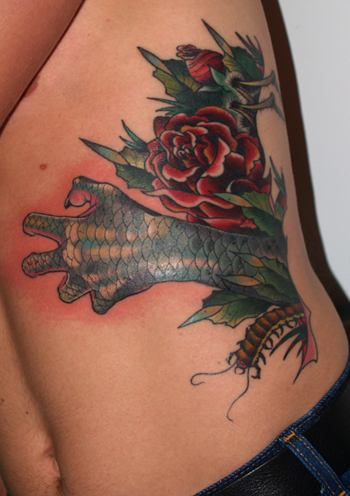 Tattoos - Skin Rips tattoos -  Evil hand